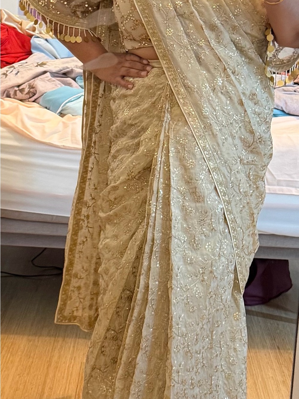 Elegant Gold Women's Saree with Intricate Embroidery